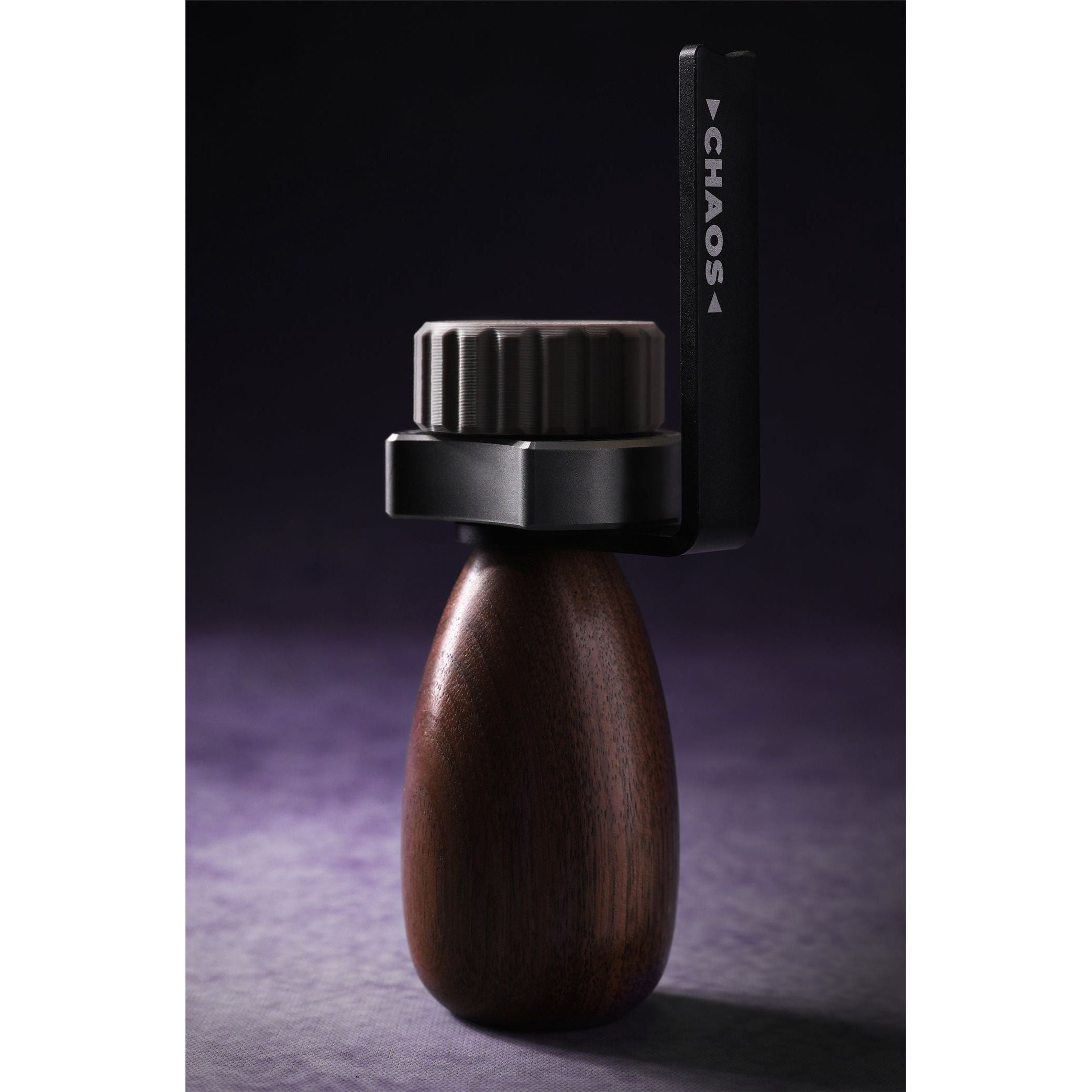 Chaos Painting Handle with ergonomic walnut grip and rotating aluminum base for precision miniatures.