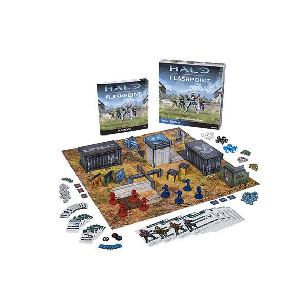 HALO: Flashpoint- Recon Edition tabletop game components, including Spartan models, rulebook, play mat, terrain, tokens, weapon and player cards, and dice.