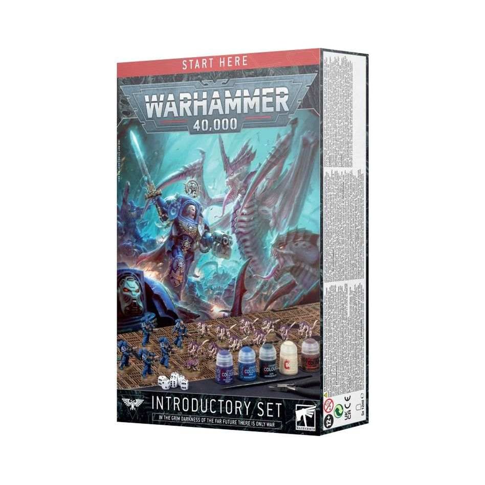 Warhammer 40000 Introductory Set box featuring Space Marines and Tyranids miniatures, paints, and game accessories.