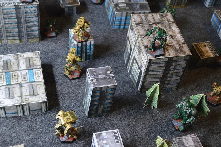 BattleTech: Alpha Strike tabletop game with miniatures and buildings.