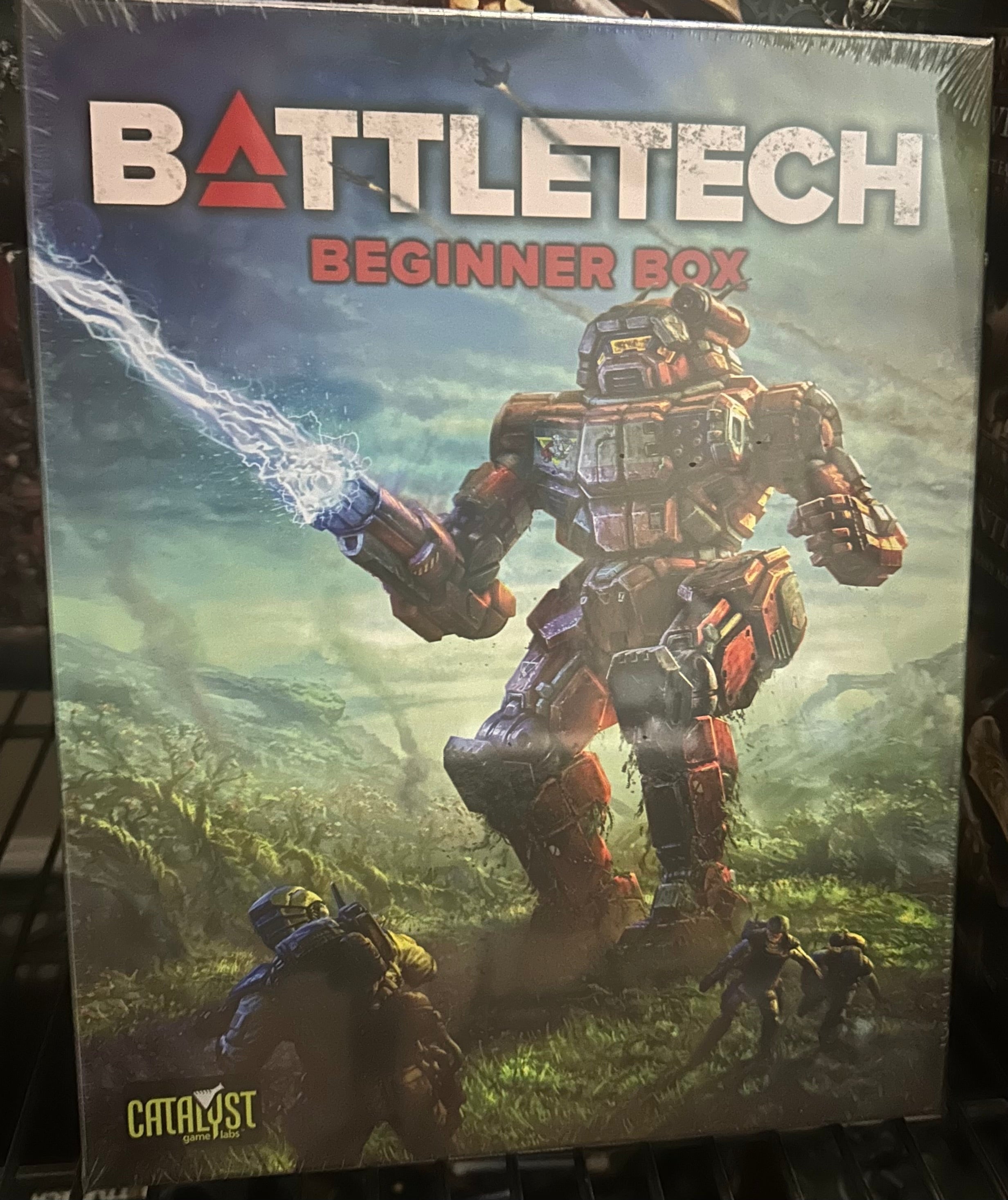 BATTLETECH: BEGINNER BOX cover featuring an armored combat scene with MechWarriors.