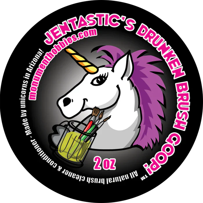 Jentastic's Drunken Brush Goop 2oz bottle with unicorn illustration and brush holder.