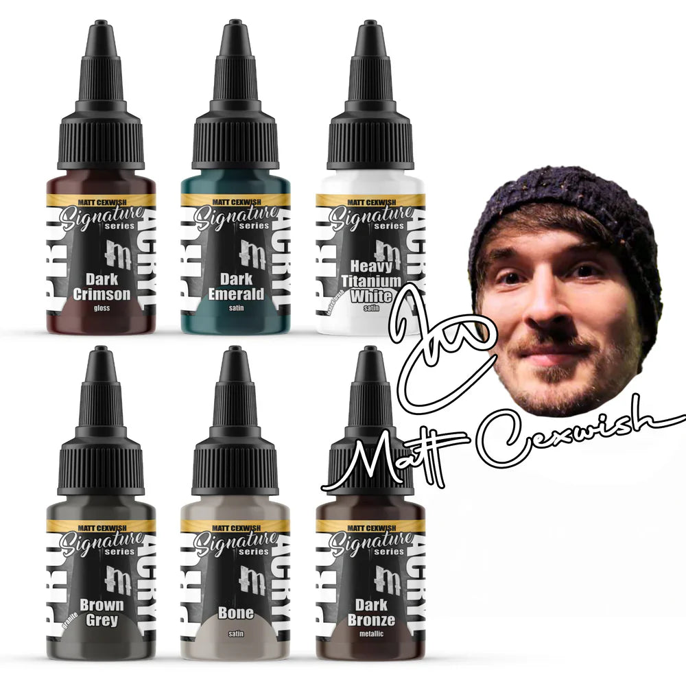 Monument Hobbies Signature Series Set 4 by Matt Cexwish featuring six 22ml paint bottles: Dark Crimson, Dark Emerald, Heavy Titanium White, Brown Grey, Bone, Dark Bronze.