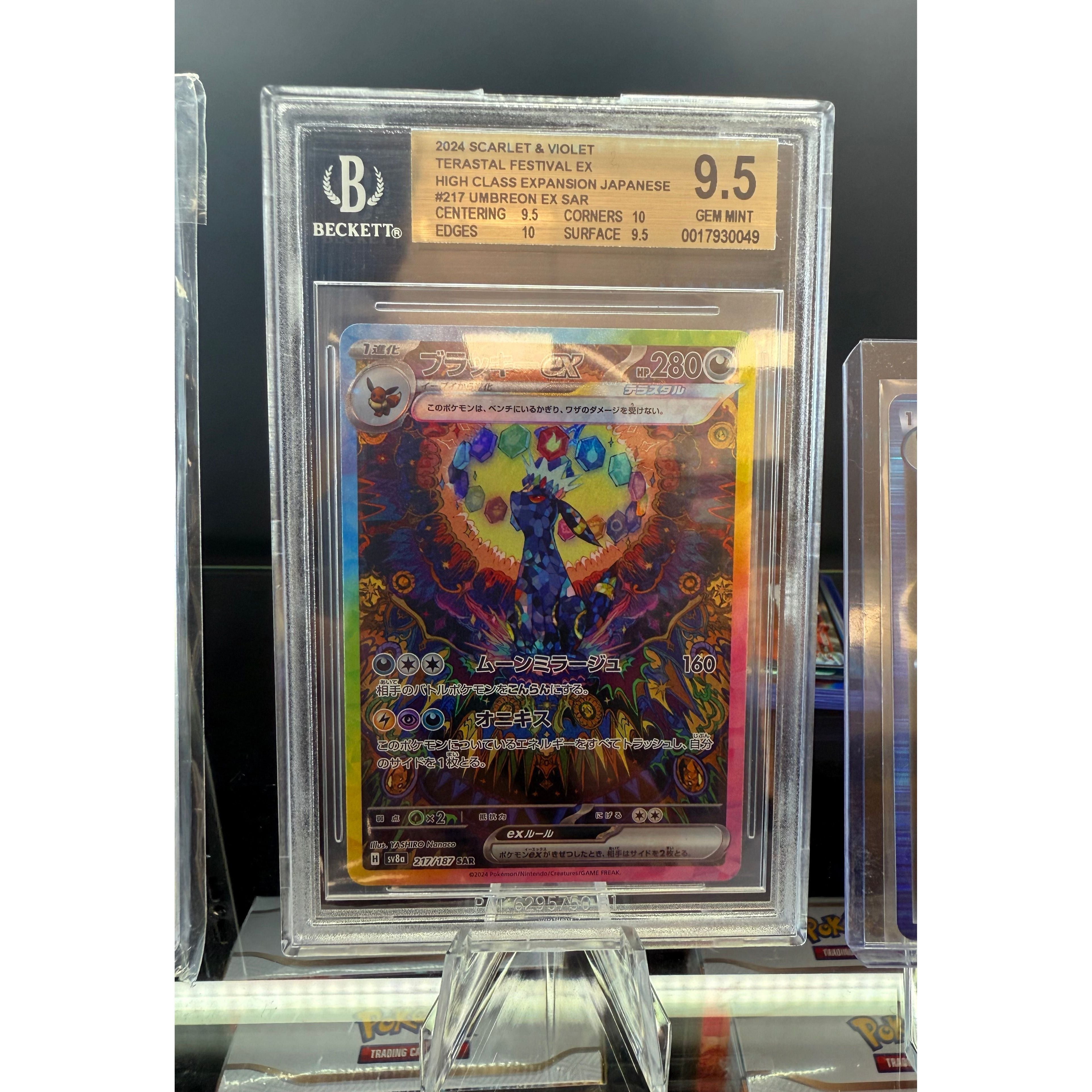 Umbreon 9.5 BGS graded card in protective casing.